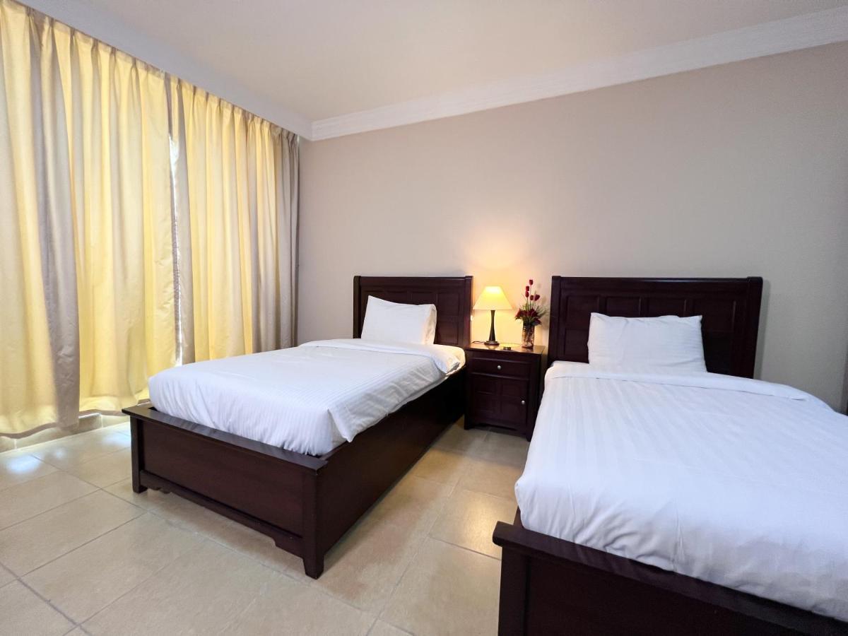 Amt Mena Aparthotel Doha Buitenkant foto